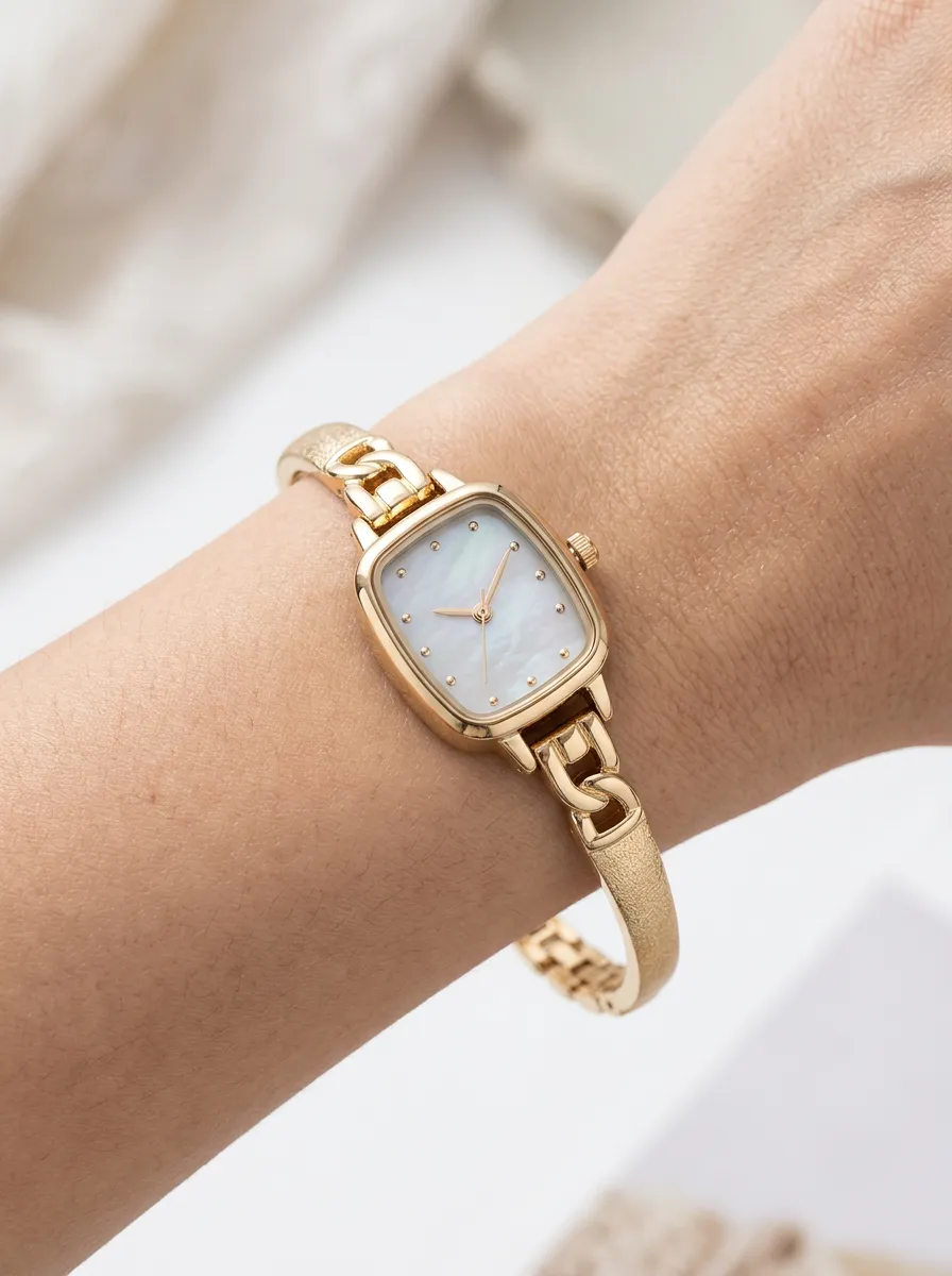 Gold-tone Mother-of-pearl Dial Chain Link Watch