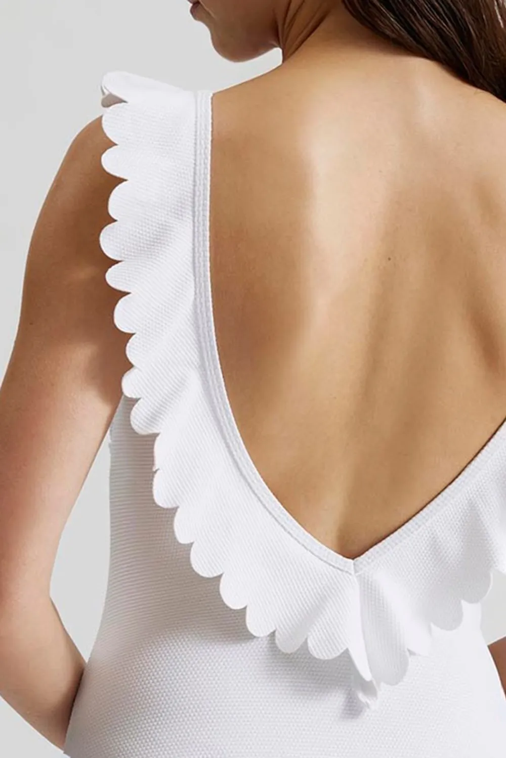 White Sleeveless Swimsuit With Frills
