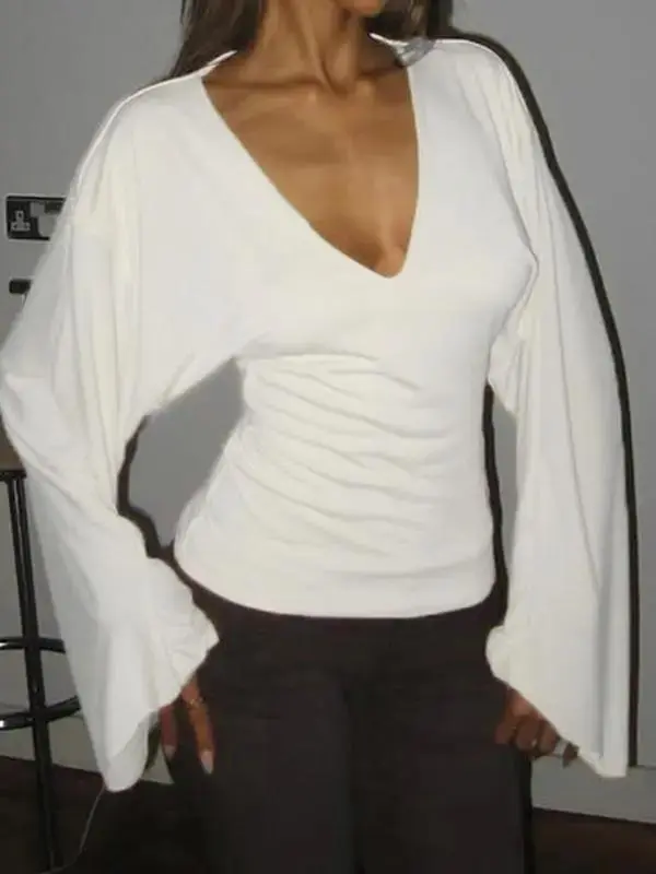 Elegant women's solid-color long-sleeved T-shirt, featuring a sexy deep V-neck and a slim-fit design