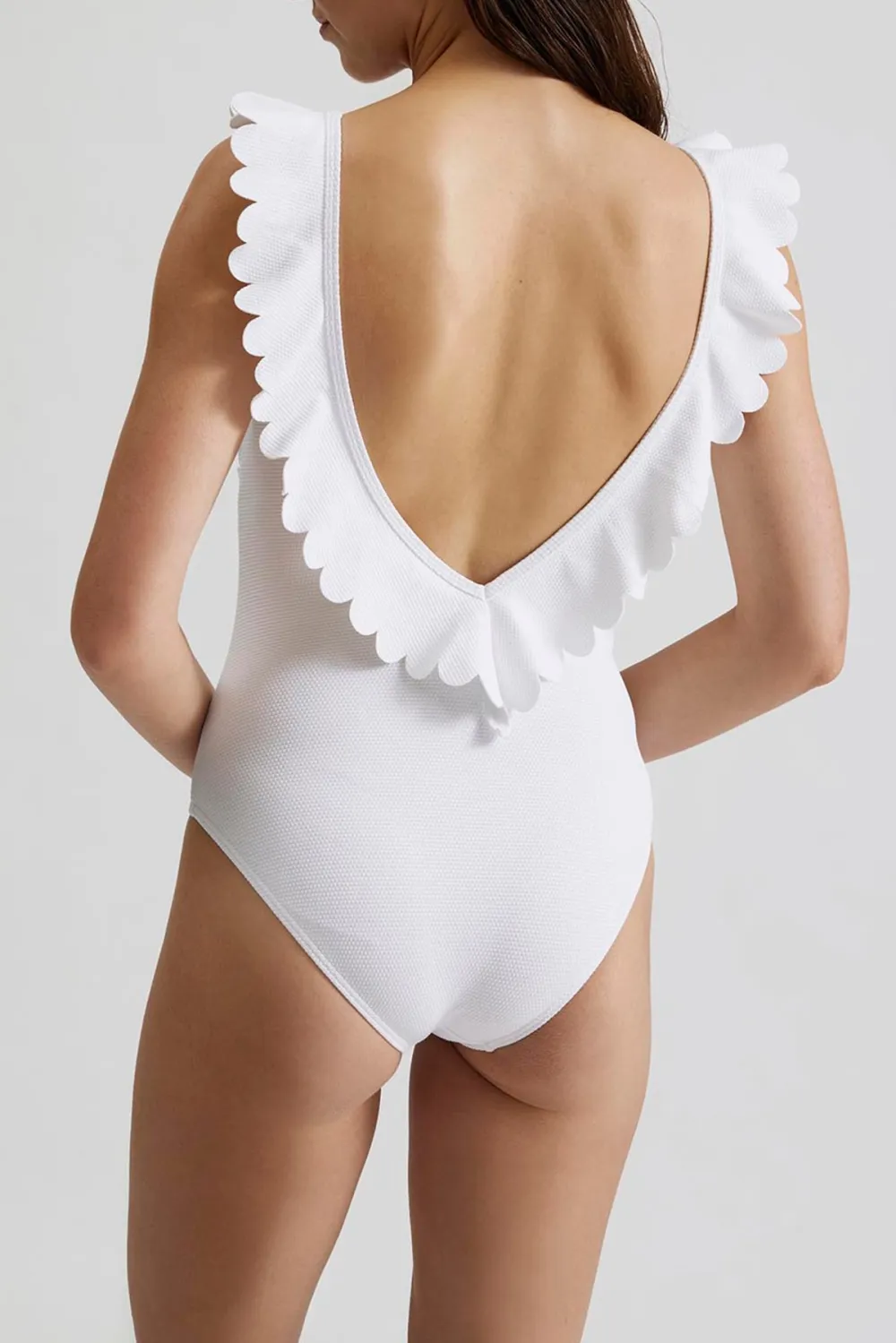 White Sleeveless Swimsuit With Frills