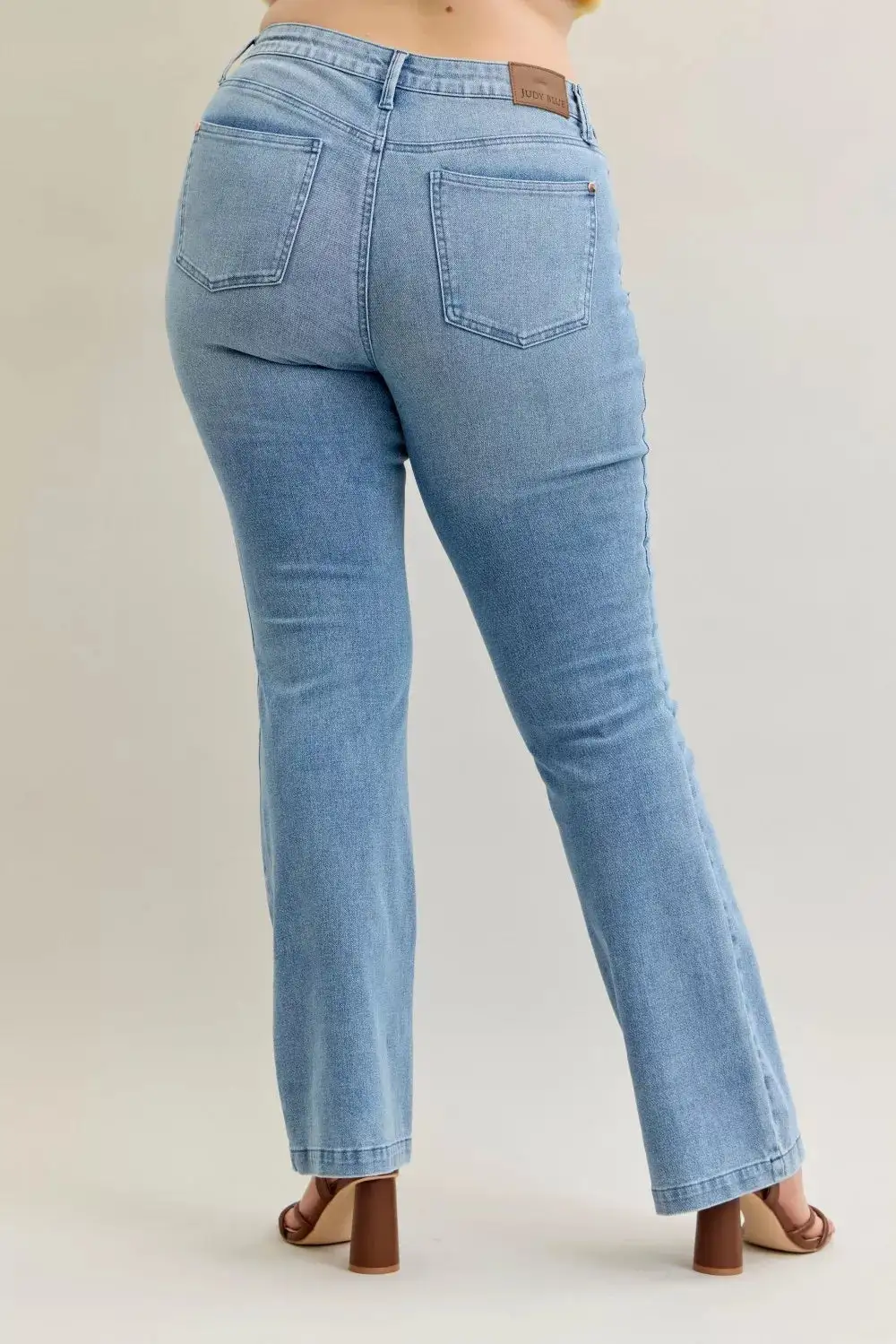 Tailored Mid Rise Flare Leg Pocketed Denim Jeans