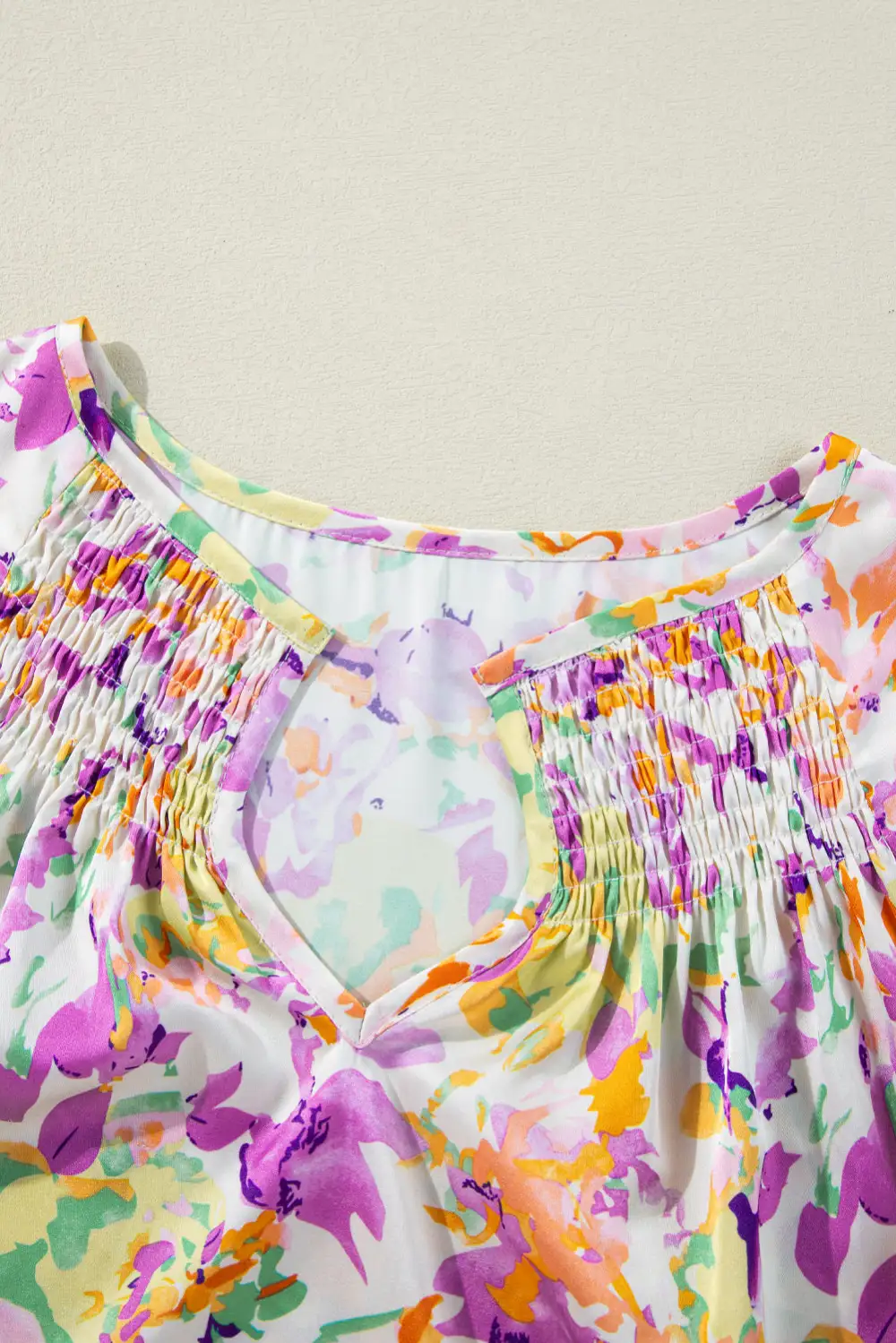Abstract Print Ruffled Notched Neck Blouse