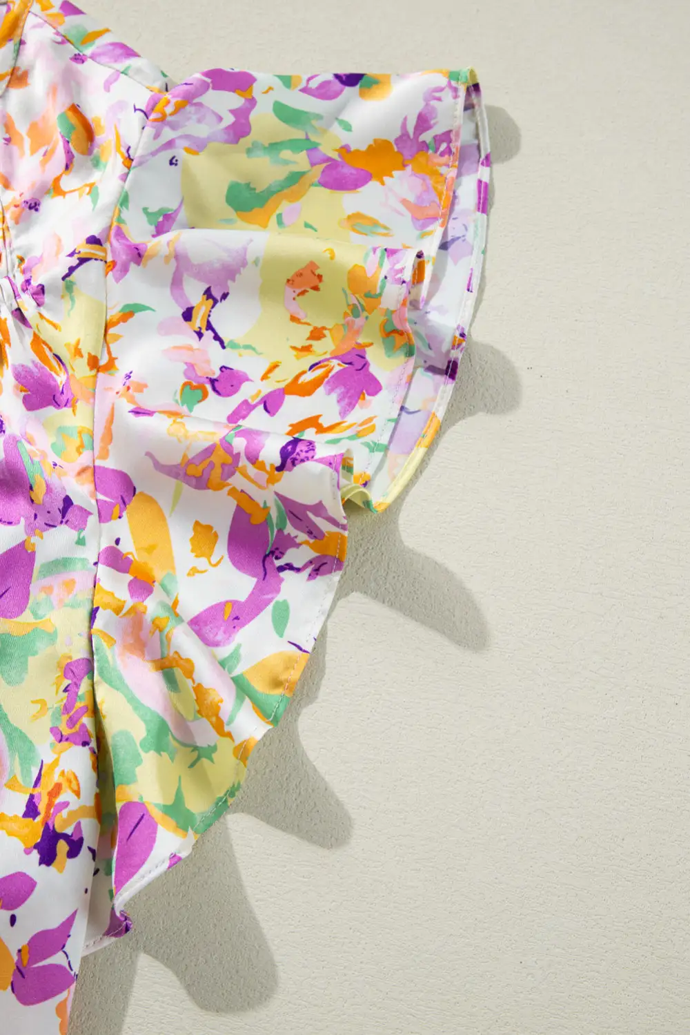 Abstract Print Ruffled Notched Neck Blouse