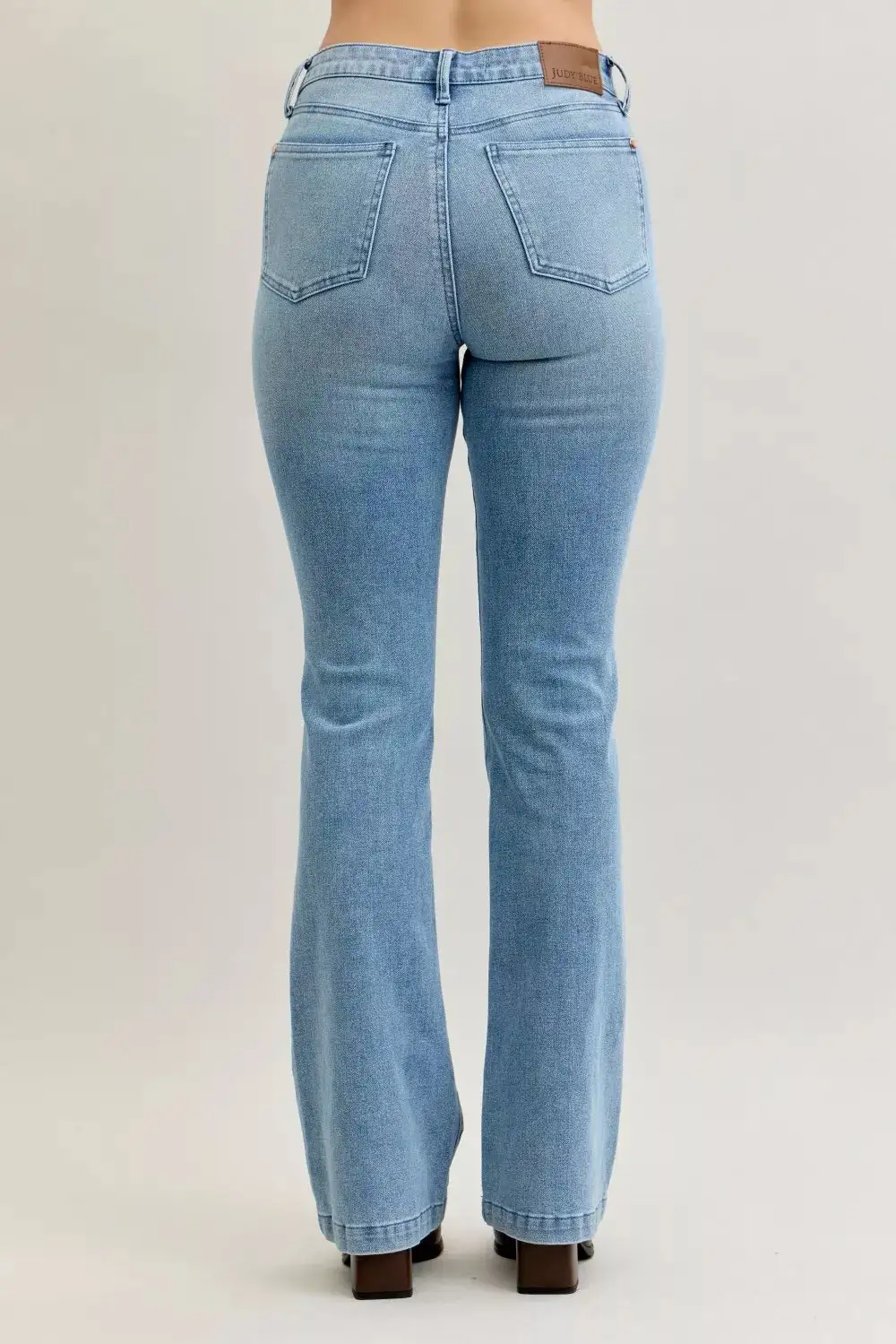 Tailored Mid Rise Flare Leg Pocketed Denim Jeans