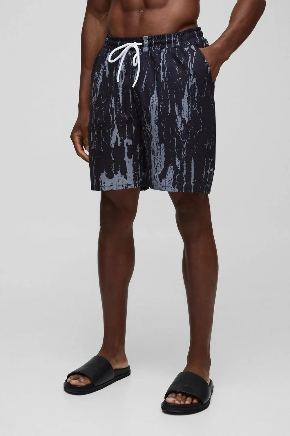 Daily Regular Fit Mid Length Abstract Leaf Print Swim Trunks