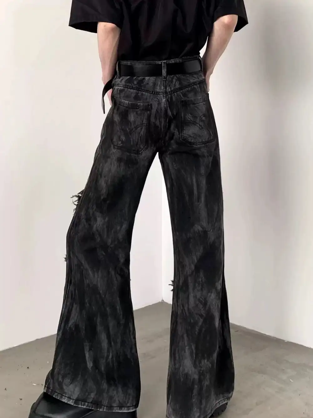 Distressed Flared Jeans With Frayed Seams