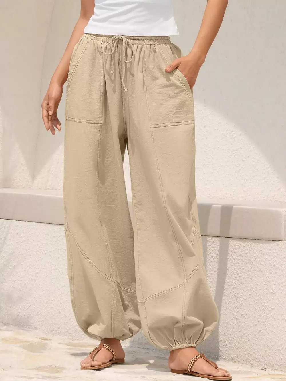 Relaxed-Fit Drawstring Pocketed Exposed-Seam Jogger Pants