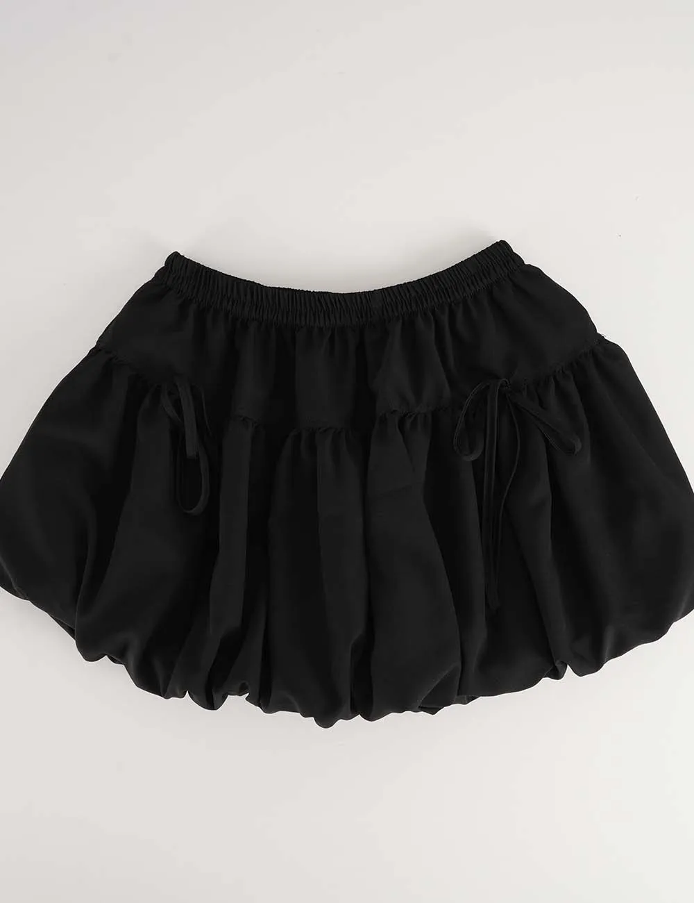 Solid Color Bubble Hem Bow Elastic Waist Mini Skirt