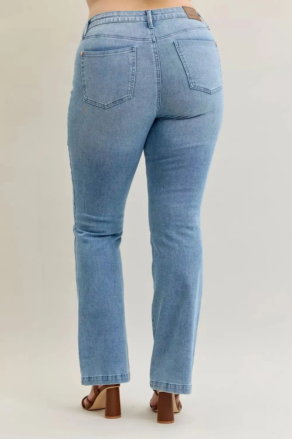 Tailored Mid Rise Flare Leg Pocketed Denim Jeans